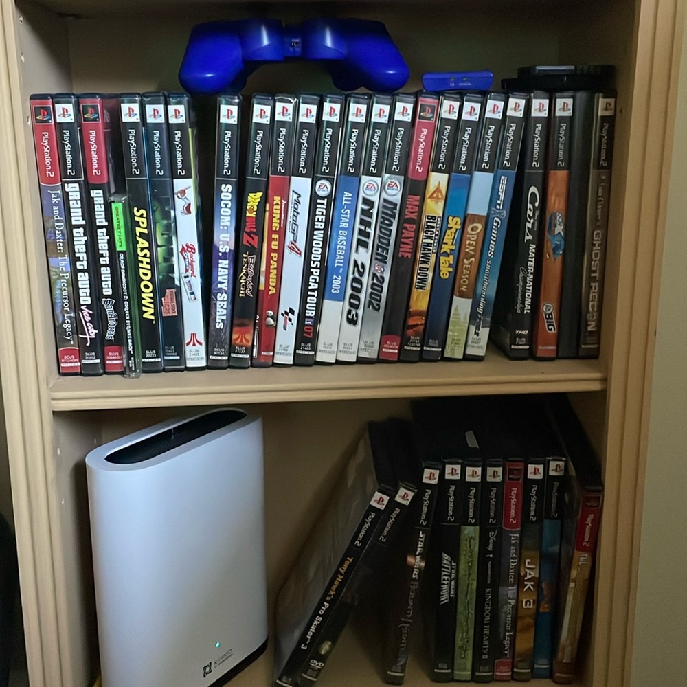 PlayStation 2 Games, Controller, and memory cards.